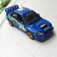 Illustration for article titled 1:43 Subaru Impreza WRC 2003 champion